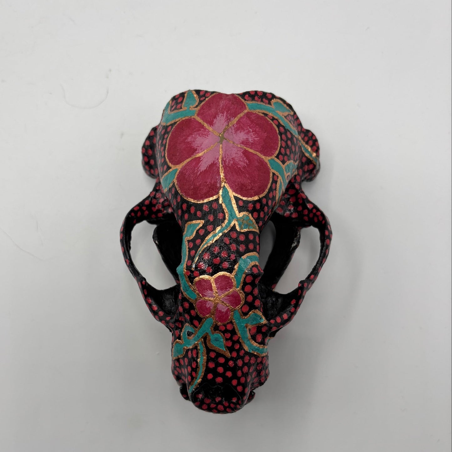 Decorative item with floral design on a white background