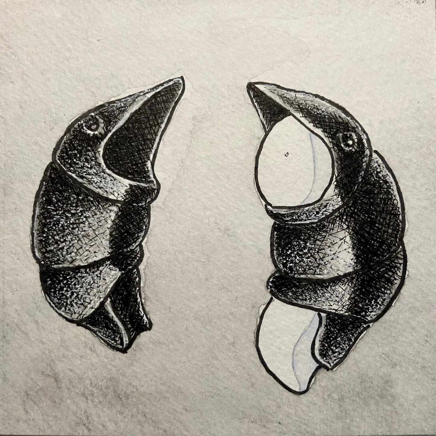 A square black and white drawing on textured paper showing two stylized bird-like head shapes facing inward, with one fully shaded and one partially filled with white negative space, photographed against a light neutral background.