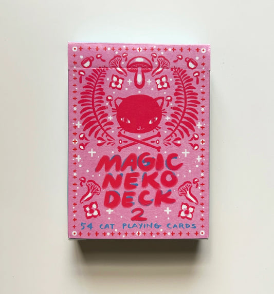 Pink 'Magic Neko Deck 2' playing cards box with cat illustration on a white background