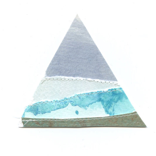 Triangular paper craft with watercolor design on a white background