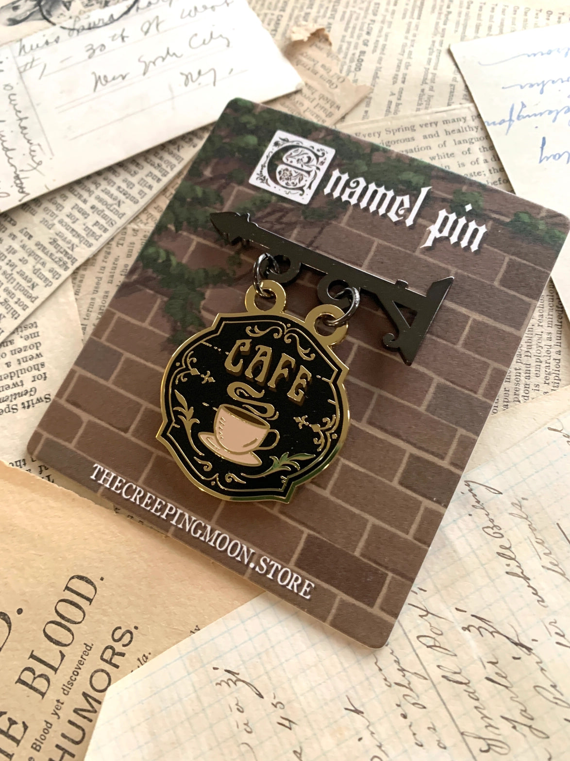 The Creeping Moon "Cafe Shop Sign" Enamel Pin