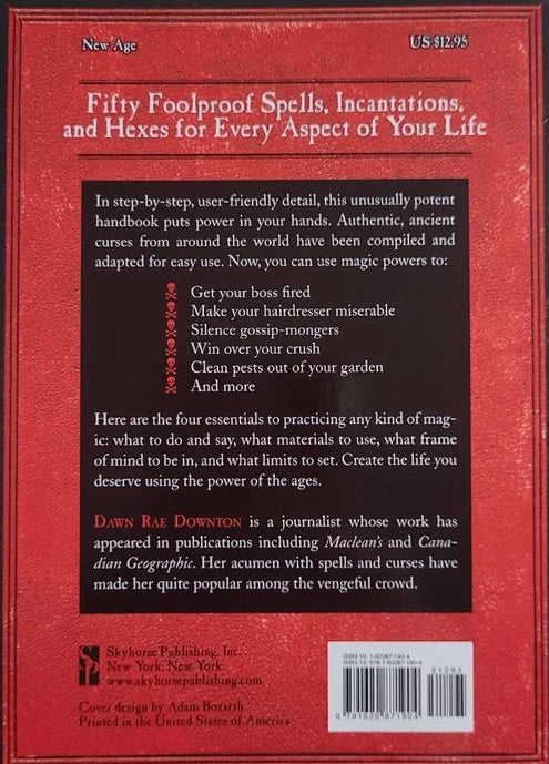 Back cover of a book titled 'Fifty Foolproof Spells, Incantations, and Hexes for Every Aspect of Your Life' on a floral fabric background.
